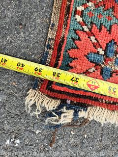 Tribal Kilim Rug on Red Ground. 39 x 59"