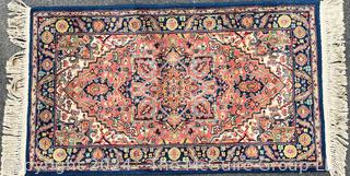 Karastan Heriz Wool Hand Woven Rug on Blue Ground. 24 x 60"