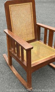 Arts and Crafts Cane Rocking Chair Made by Stickley Brothers  Quaint Furniture with Brass Label. 