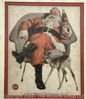 Framed Under Glass Reprint of 1956 Coca Cola Christmas Ad  "Santa with A Baby Doe". 15 x 18"