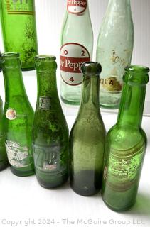 Collection of Green Soda Glass Bottles