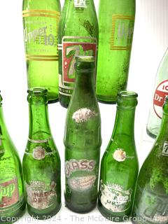 Collection of Green Soda Glass Bottles