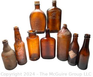 Collection of Brown Glass Bottles