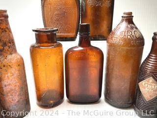 Collection of Brown Glass Bottles