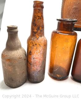 Collection of Brown Glass Bottles