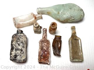 Collection of Melted Bottles from Privy Dig