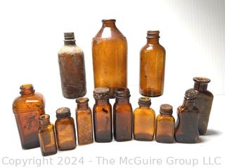 Group of Brown Glass Medicine Bottles