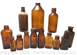 Group of Brown Glass Medicine Bottles