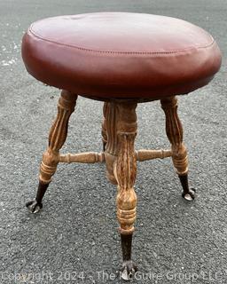 Victorian Piano Stool with Claw Feet Holding Glass Ball. 18" tall.