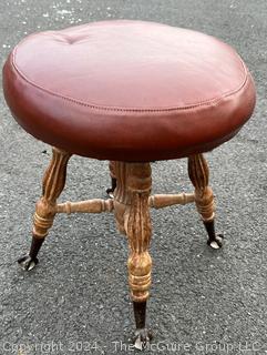 Victorian Piano Stool with Claw Feet Holding Glass Ball. 18" tall.