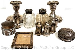 Collection of Sterling Silver Items Including Tricket Boxes, Frames, Candle Sticks and Salt & Pepper 