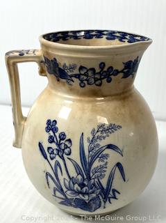 Three (3) Pieces of Blue and White Transferware Including Pitcher, Creamer and Sugar.