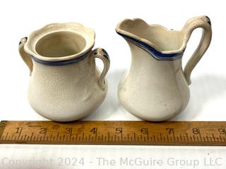 Three (3) Pieces of Blue and White Transferware Including Pitcher, Creamer and Sugar.