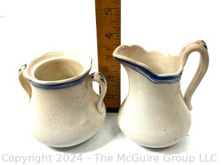 Three (3) Pieces of Blue and White Transferware Including Pitcher, Creamer and Sugar.