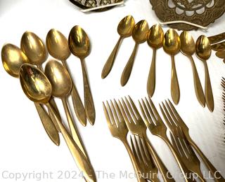 Set of (6) Flatware Place Settings, Trivets, Candle Snuffer and Pair of Candlesticks.