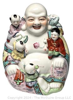 Chinese Porcelain Laughing Buddha With Five Children Statue.  12" tall