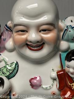 Chinese Porcelain Laughing Buddha With Five Children Statue.  12" tall