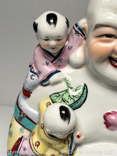 Chinese Porcelain Laughing Buddha With Five Children Statue.  12" tall