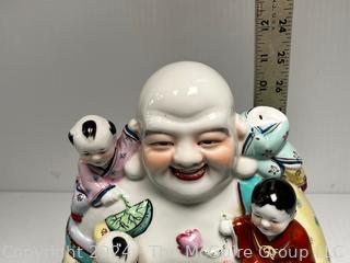 Chinese Porcelain Laughing Buddha With Five Children Statue.  12" tall