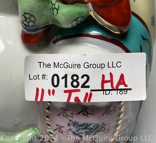 Chinese Porcelain Laughing Buddha With Five Children Statue.  12" tall