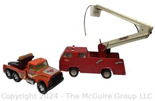 Two (2) Metal Toy Trucks Including Tonka Snorkel Fire Truck and NYLINT 'Big Pumpkin' Tow Truck