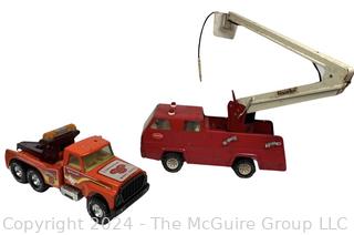 Two (2) Metal Toy Trucks Including Tonka Snorkel Fire Truck and NYLINT 'Big Pumpkin' Tow Truck