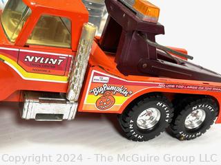 Two (2) Metal Toy Trucks Including Tonka Snorkel Fire Truck and NYLINT 'Big Pumpkin' Tow Truck