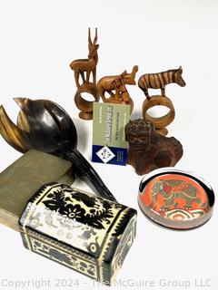 Carved African Napkin Rings, Carved Horn Serving Spoons, Inlaid and Silver Plated Box, Glass Paperweight and Chinese Pottery Foo Dog Figurine.