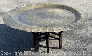 Large Etched Moroccan Brass Serving Tray with Fluted Edge on Wood Folding Base. 40" diameter.