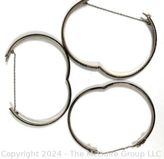 Set of Three (3) Sterling Silver Hinged Bangle Bracelet with Safety Chains.