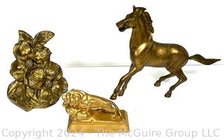 Three (3) Metal Statues Including Horse, Lion and Flowers. 