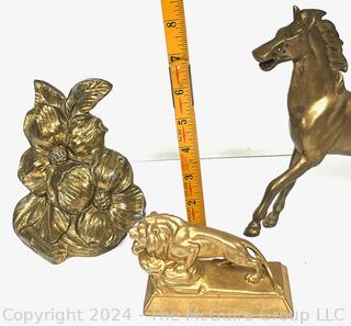 Three (3) Metal Statues Including Horse, Lion and Flowers. 