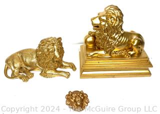 Three (3) Golden Lions Including Belt Buckle