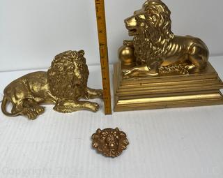 Three (3) Golden Lions Including Belt Buckle