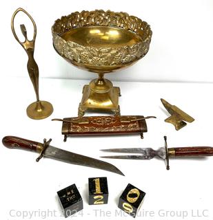 Group of Decorative Metalware including Brass Pedestal Bowl, Modernist Dancer Sculpture, Jewelers Anvil. Knife & Fork Carving Set in Wood Case & Block Desk Calendar.