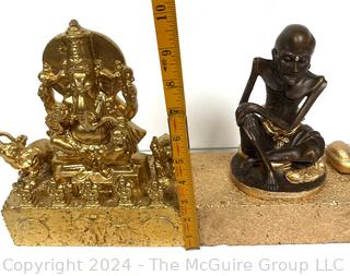 Two (2) Metal Buddhist Statues Mounted on Bricks Including Ganesh and Monk