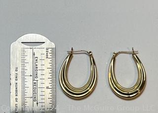 14kt Yellow Gold Hollow Hoop Earrings.  2.3 grams. 