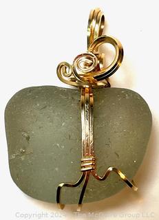 Green Sea Glass Pendant in Hand Wrought 14kt Yellow Gold Wrap Setting. 2.6 grams (surround only)