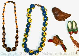 Two (2) Carved & Painted Bead Necklaces and Three (3) Wood Carved Brooches.