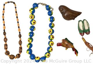 Two (2) Carved & Painted Bead Necklaces and Three (3) Wood Carved Brooches.