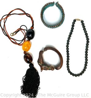 Jewelry Including Carved Wood Horse Bracelet, Beaded Bracelet, Green Stone Bead Necklace and Amber Color Bead Necklace