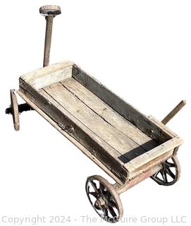 Primitive Childs Wooden Wagon. Note the Hand Brake