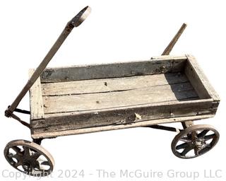 Primitive Childs Wooden Wagon. Note the Hand Brake