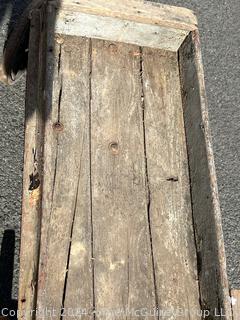 Primitive Childs Wooden Wagon. Note the Hand Brake