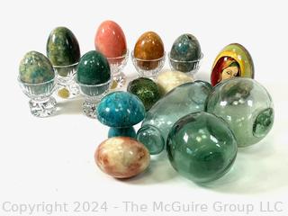 Collection of Alabaster Marble Eggs on German Crystal Riser and Three (3) Blown Glass Fish Net Floats.