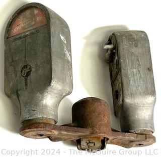 Early (1950) Dual Metal Parking Meters on Bracket. Manufactured by Duncan 