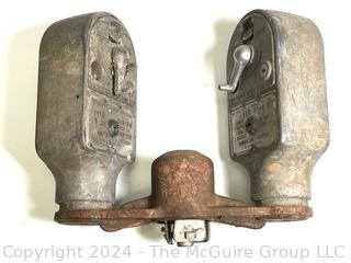 Early (1950) Dual Metal Parking Meters on Bracket. Manufactured by Duncan 