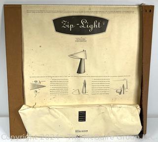 "Zip-Light" Modern Design Leather Lamp Designed by Sigmar Willnauer 1993. 22"H x 19 1/2" W x 5" D