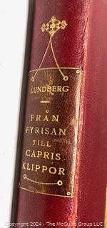 Book: Fran Fyrison till Capris Klipper av Ellen Lundberg-Nyblom. Published in Stockholm by Hugo Gebers Forlag 1931.  Red fine grained Quarter Moroccan leather with Marbled Boards.  1st Edition