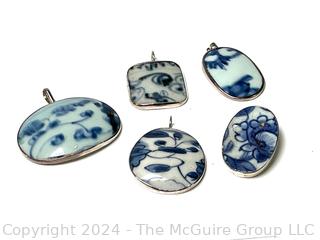 Five (5) Chinese Blue & White Porcelain Shard Pendants in Silver Surround.